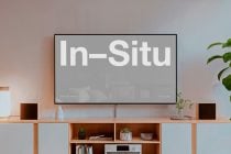 Horizontal TV screen mockup above modern wood storage cabinet with decor