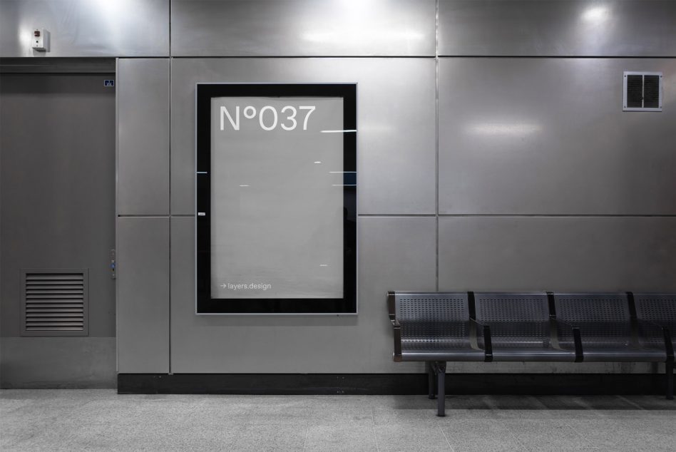 Modern poster mockup in a minimalistic subway station setting with metallic walls and bench, perfect for presentations and urban design showcases.