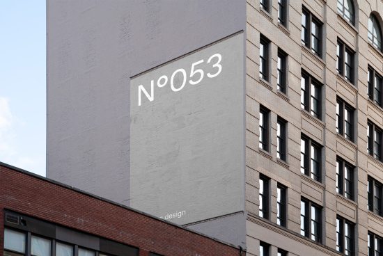 Minimalist building signage mockup in urban setting for advertising design presentation, using modern typography, ideal for fonts and templates.