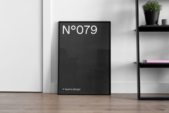Modern poster mockup in a sleek frame leaning against a white wall next to a shelving unit with decor, ideal for presentations and portfolios.
