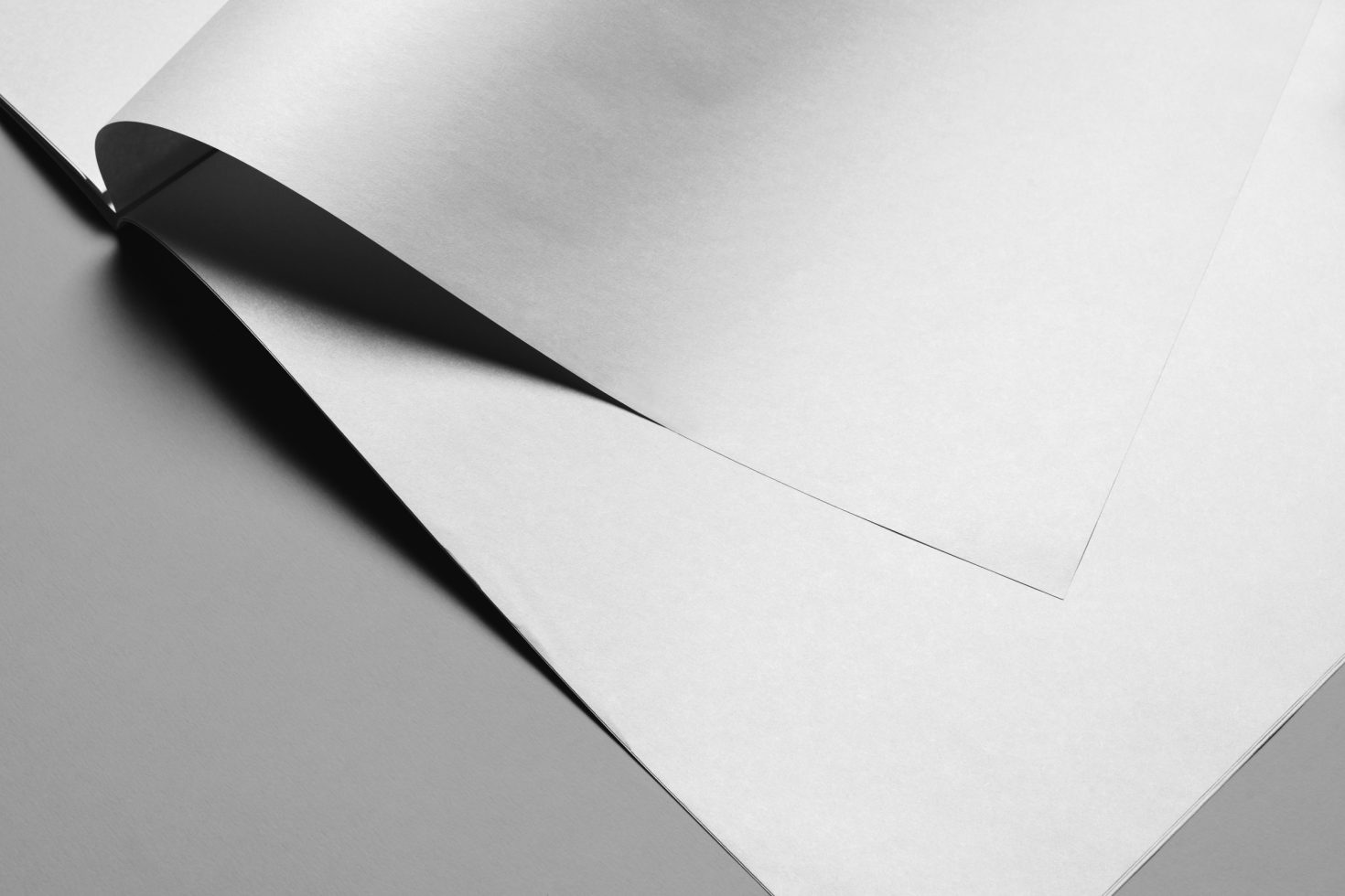 Elegant paper mockup with shadow play, ideal for presenting stationery designs, invitations, flyers or branding graphics.