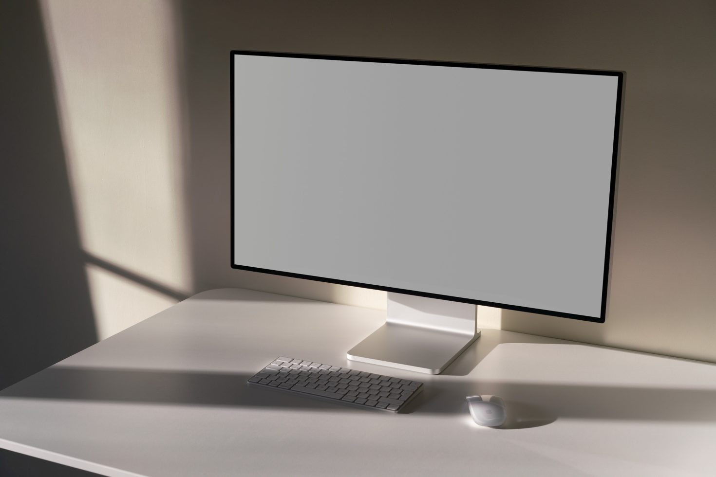 Elegant computer monitor on desk mockup with natural light shadows, perfect for showcasing UI/UX designs, desktop templates, and digital graphics.