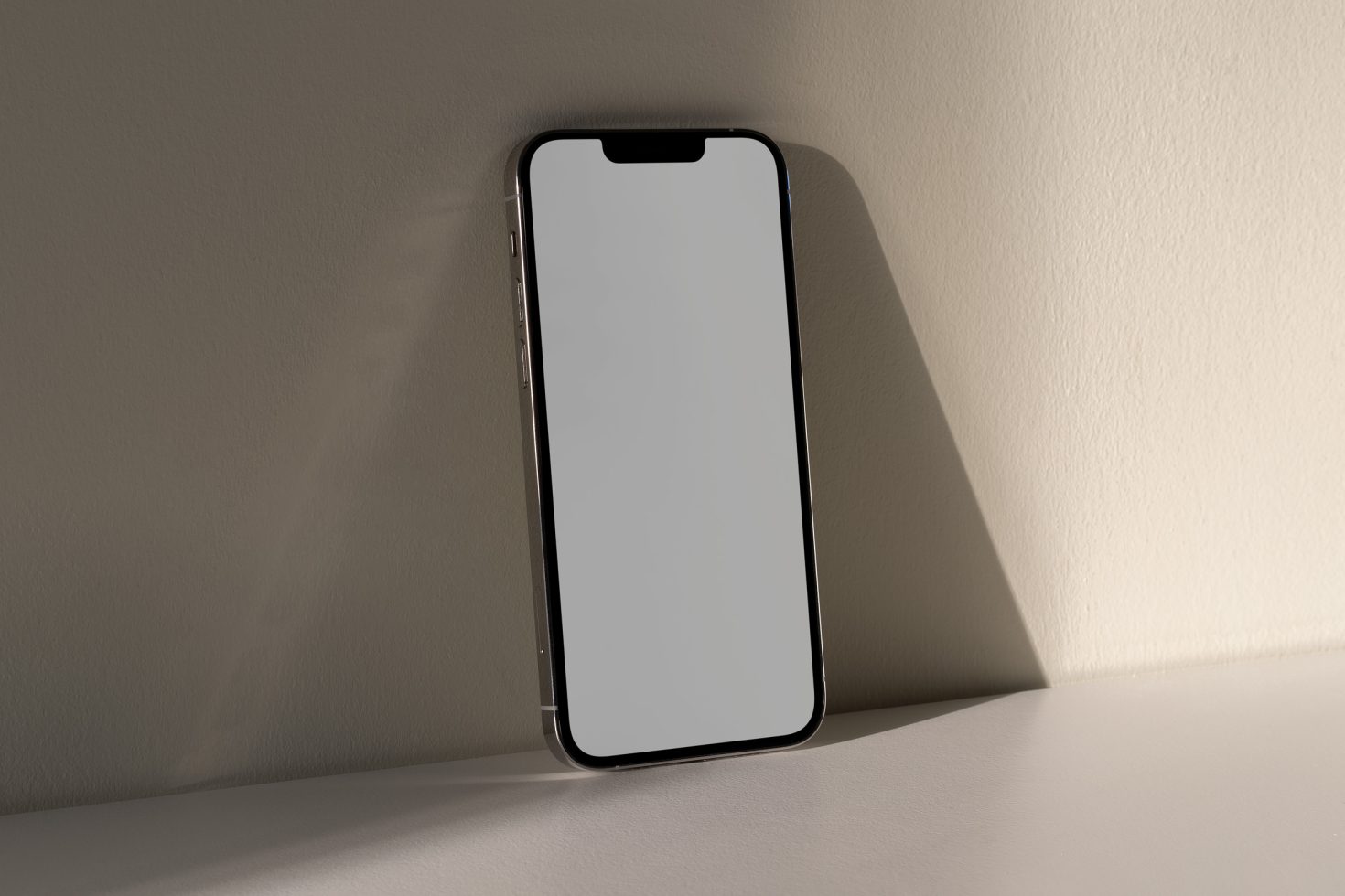 Smartphone mockup standing on a gray surface with shadow, blank screen for design presentation, digital asset for graphic designers.