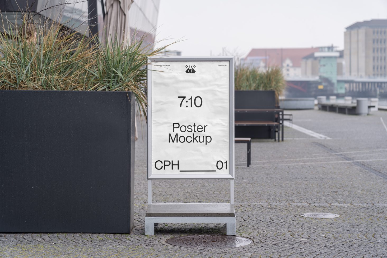 Urban outdoor poster mockup display in a pedestrian area, showcasing a clear and editable design template for advertising.