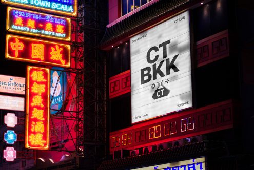 Neon sign mockup on Bangkok street with vibrant lights for outdoor advertising graphics, neon typography, and urban design presentations.