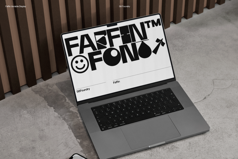 Laptop displaying bold font typeface Faffin, modern typography mockup for font designers, graphic assets with urban setup.