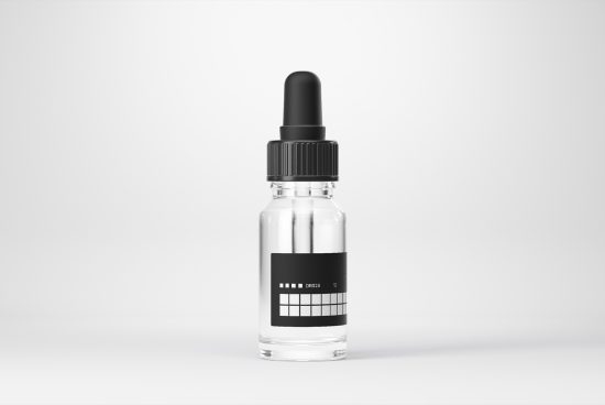 Transparent dropper bottle mockup with black cap and minimalist label design on plain background for product packaging presentation.