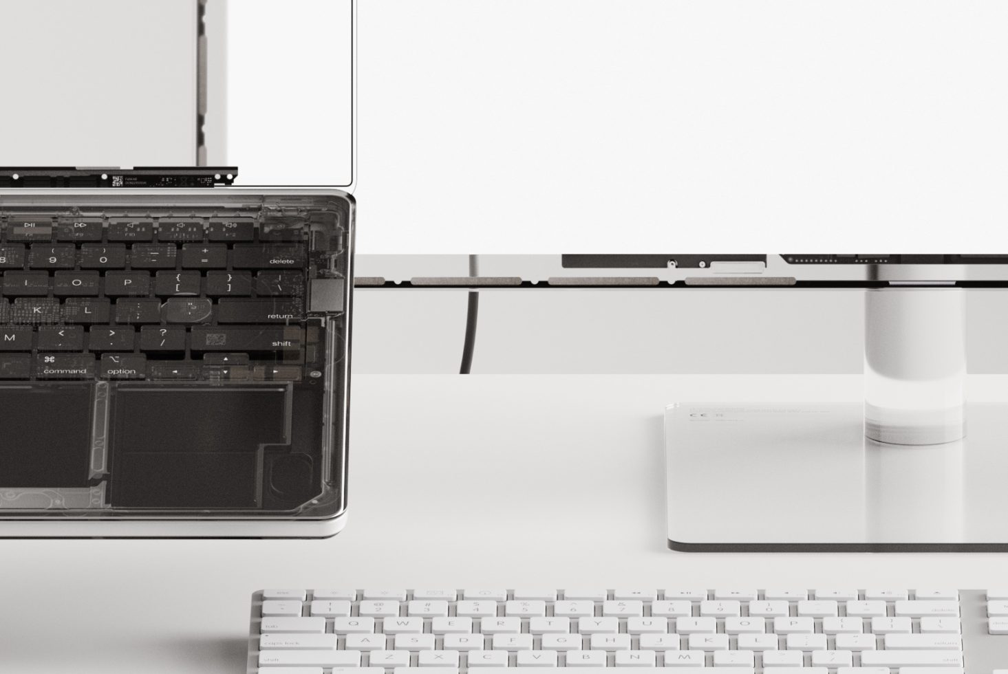 Monochrome workstation with open laptop, external monitor, keyboard, and drive for technology mockup designs and templates.