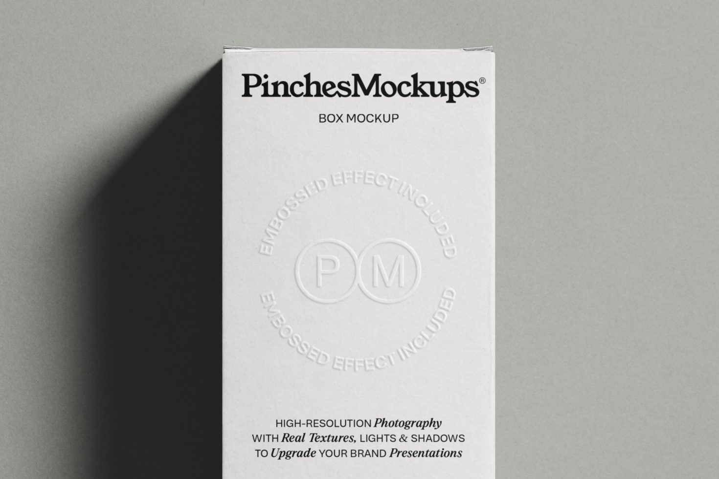 Embossed white box mockup by PinchesMockups with realistic textures and shadows for branding presentations, ideal for designers' packaging projects.