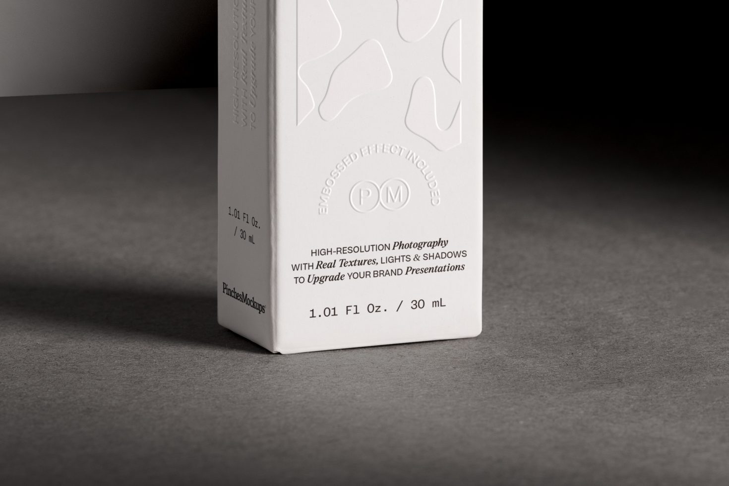 Product packaging mockup with embossed logo on a minimalist box, showcasing high-resolution textures, lighting and shadows for branding presentations.