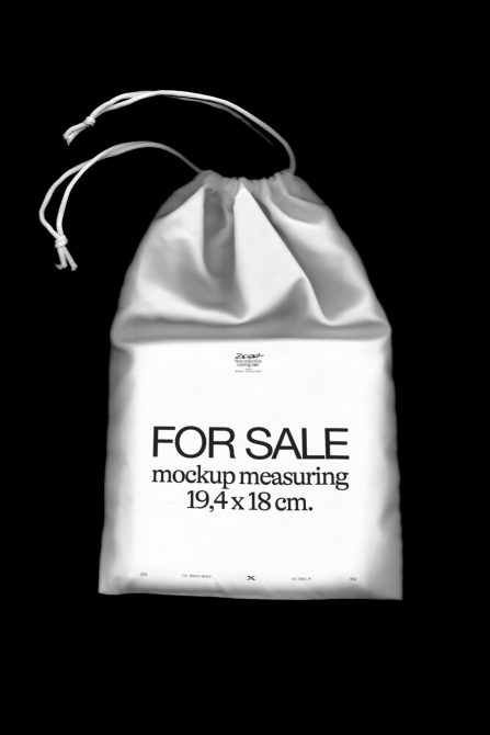 White drawstring bag mockup on black background, product packaging design, fabric pouch template for branding, 19.4x18 cm dimensions.