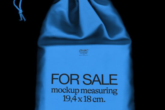Blue fabric drawstring pouch mockup with "FOR SALE" text, dimensions 19.4 x 18 cm, isolated on black, high-quality design asset for templates.