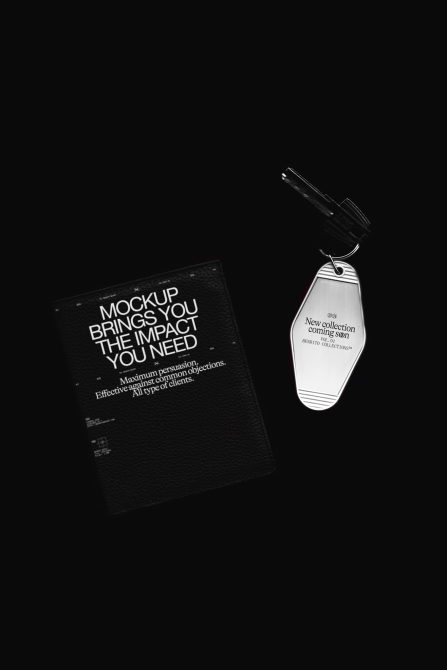 Elegant black mockup of a book and hang tag with text, isolated on a dark background, ideal for professional branding and design presentations.