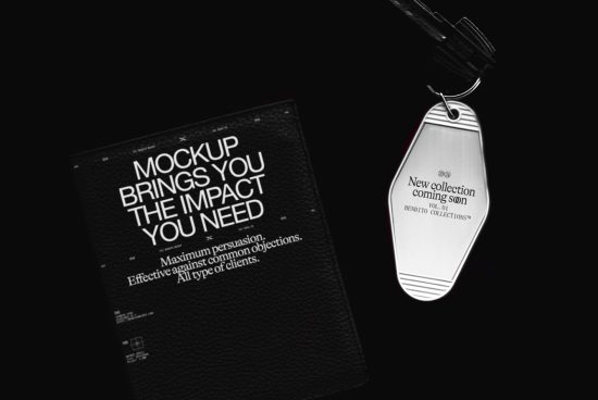 Elegant black book mockup with text and keychain on dark background, ideal for presentations and branding projects for designers.