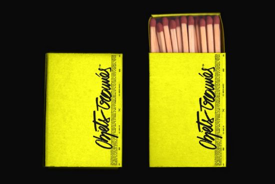 Yellow matchbox mockup with black typography design, one closed and one open showing matches, on a black background. Useful for designers' presentations.