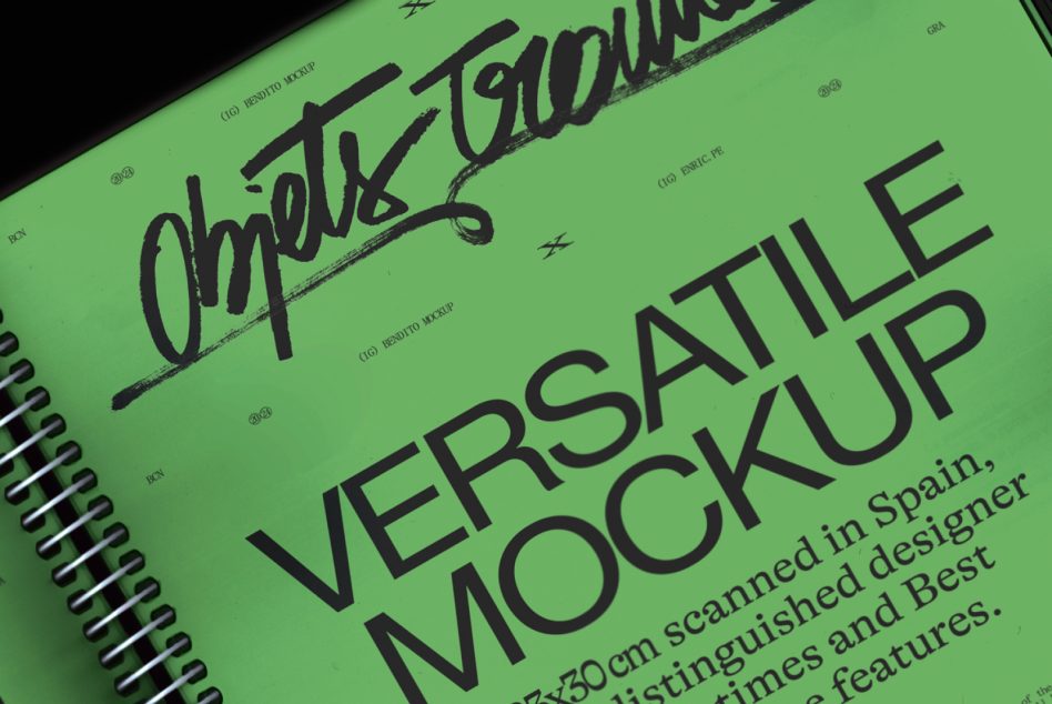 Close-up angled detail of spiral notebook with bright green pages displaying bold sans-serif text