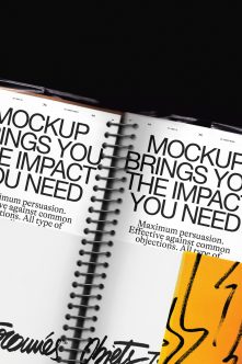 Spiral notebook mockup with bold typography, black pen, yellow accent page, overhead flat lay shot