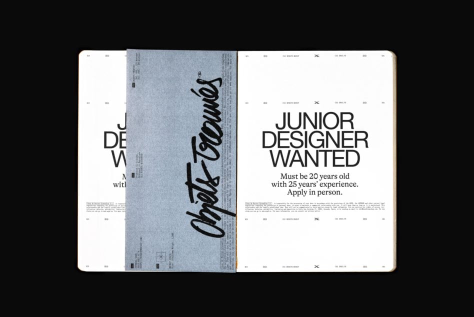 Open magazine spread mockup showing job listing with humorous impossible requirements