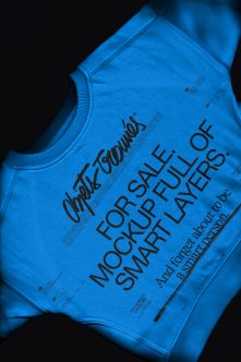 Blue tee close-up showing 'For Sale Mock-up Smart Layers' text detail