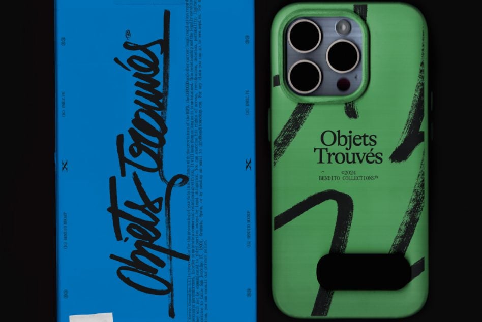 Bright blue box next to iPhone case in neon green with black strap detail on dark background