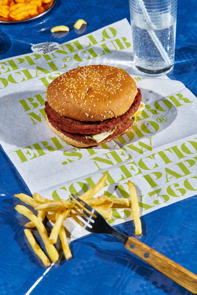 Food mockup featuring burger, fries, and drink on blue background, ideal for restaurant menu design and culinary presentations in Graphic category.