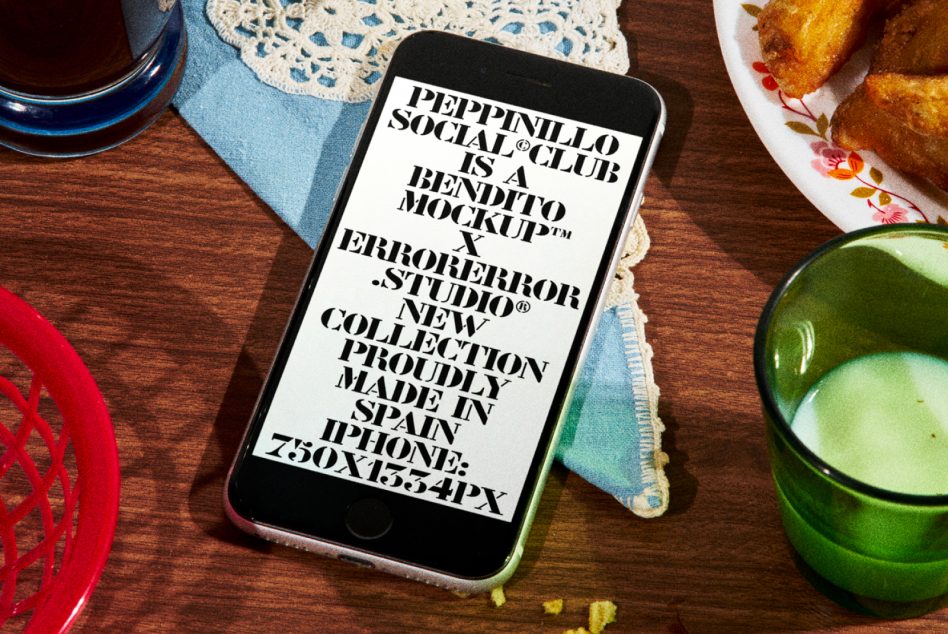 Smartphone mockup on wooden table with text design, surrounded by vintage crockery, illustrating a rustic branding template for designers.