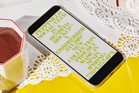 Phone mockup on a yellow background with stylized text graphics, ideal for showcasing font designs and app templates for professional designers.