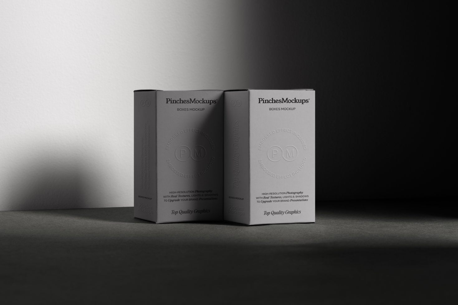 Elegant box packaging mockup by PinchesMockups with embossed logo effect for product presentation, ideal for designers to showcase branding designs.