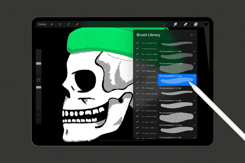 Digital art tablet displaying skull illustration with brush library, ideal for graphic templates and design mockups.