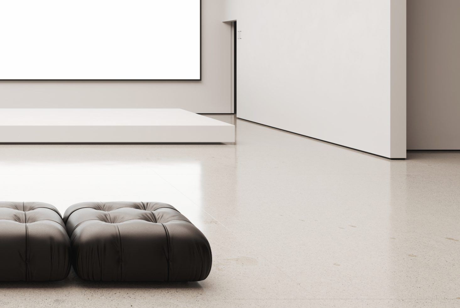 Minimalistic interior design mockup with empty frame, leather poufs, and sleek floor suitable for showcasing artwork or graphics.