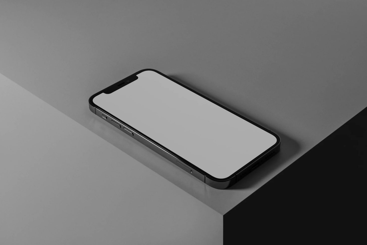 Smartphone mockup with blank screen on two-tone background, modern design, ideal for UI/UX presentation, digital assets for designers.