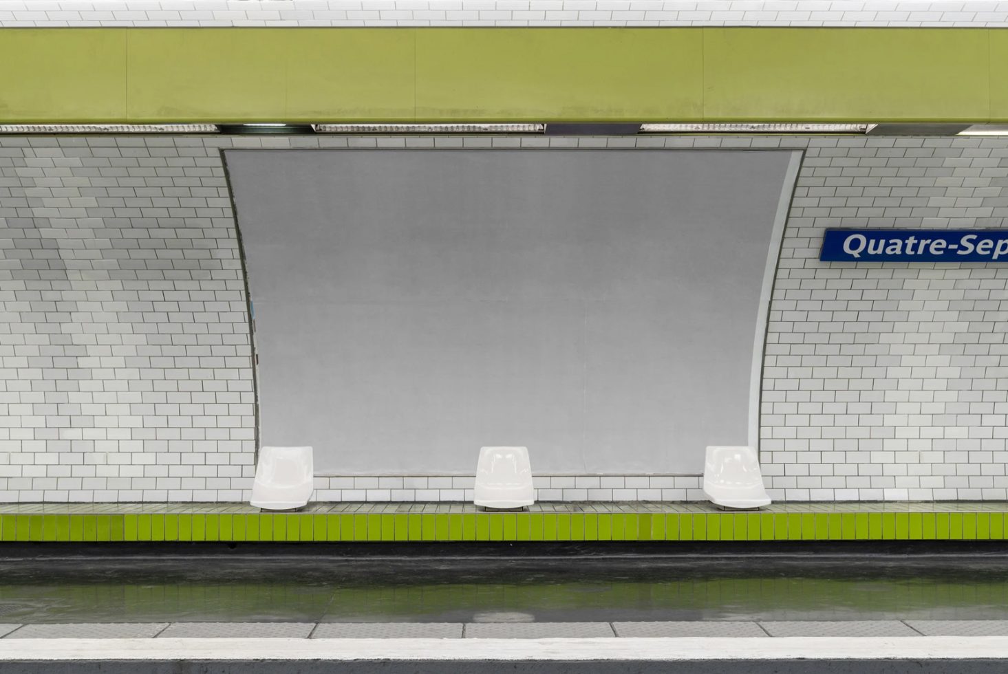 Empty subway station bench and billboard mockup with tiled wall background, suitable for ad design presentation and urban graphics display.