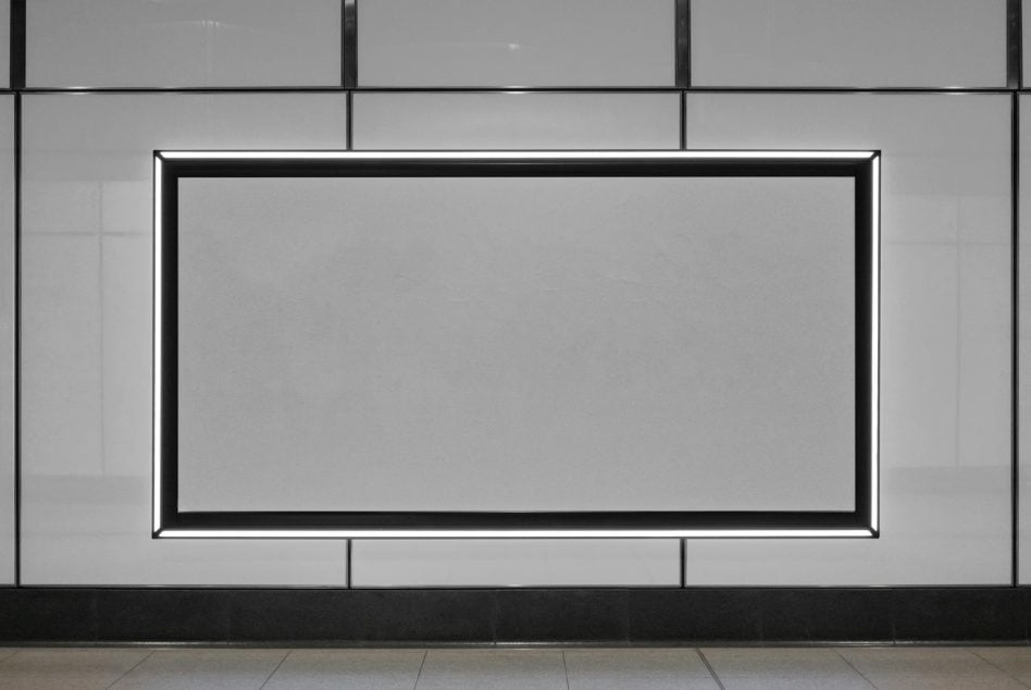 Horizontal lightbox with glowing border on subway tile wall
