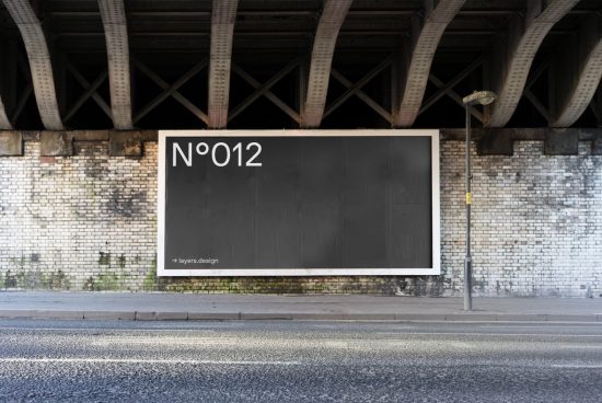 Urban billboard mockup under a bridge, ideal for designers to showcase advertising designs, featuring editable layers for customization.