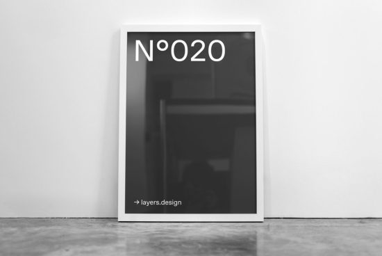 Minimalist poster mockup leaning against a white wall, modern design, ideal for presentations and portfolios, editable graphics template.