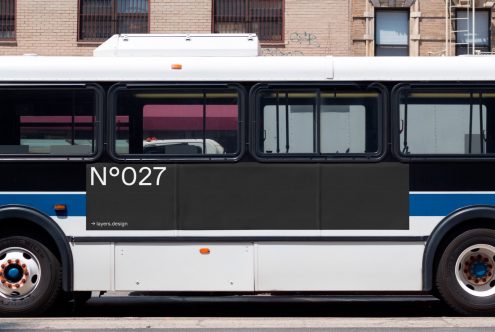 City bus mockup side view with editable surface for vehicle branding, advertising design, and transport graphics presentation.