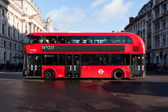 Red London double-decker bus in urban setting, clear for use in mockups, urban transport design templates, and city-themed graphics.