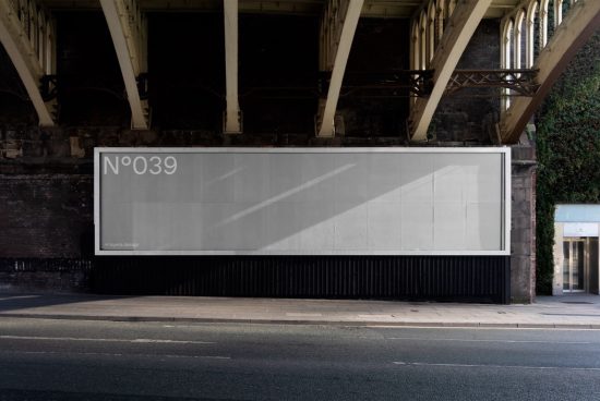 Blank billboard mockup under bridge for outdoor advertising, clear sky, urban environment, ideal for poster design presentations.