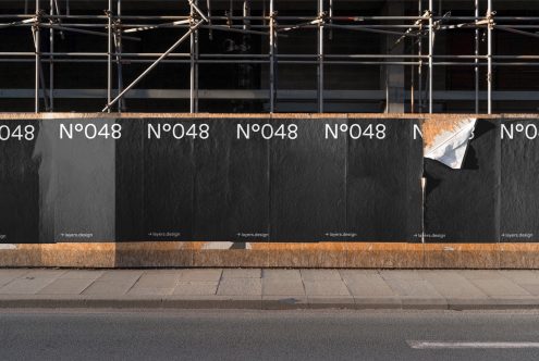 Scaffolding with posters mockup on street wall for outdoor advertising design presentation and portfolio display.