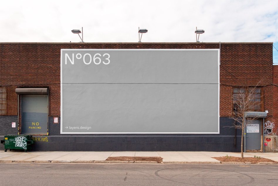 Large horizontal billboard on brick warehouse with split layout mockup sections