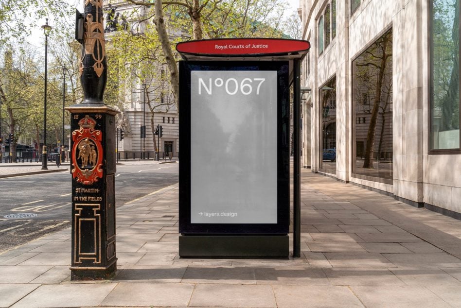 Light colored poster showing N°067 on street with red topped shelter