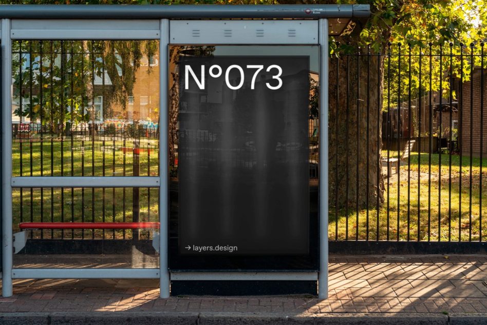 Bus stop billboard mockup in an urban setting perfect for designers to showcase advertising designs and graphics in a realistic environment.