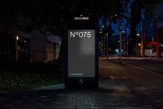 Illuminated street billboard mockup at night with urban background, perfect for showcasing outdoor advertising and poster designs.