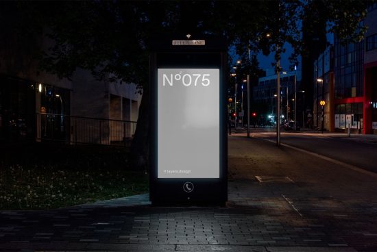 Outdoor billboard mockup at night on urban street for advertising design presentation and portfolio display.