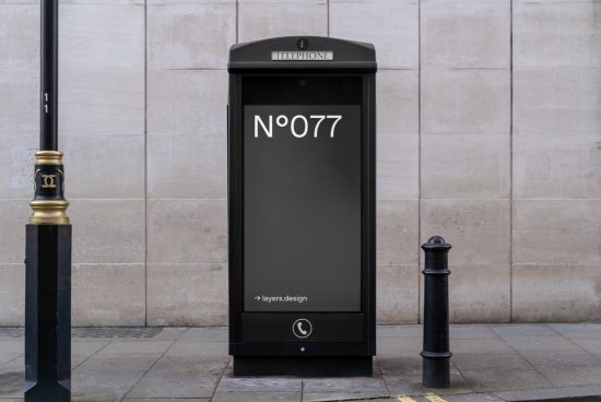 Urban phone booth mockup with editable display for advertising, perfect for designers to showcase ads and graphics in a realistic setting.