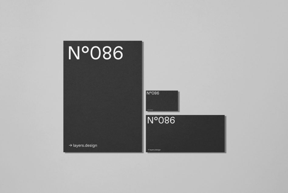 Dark stationery mockup set with oversized folder, cards, letterhead N°086