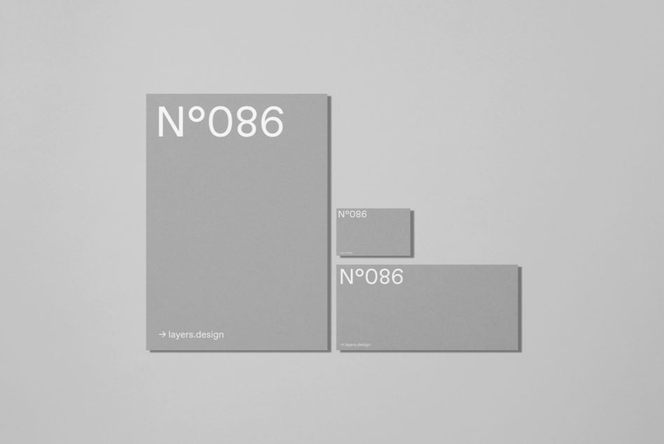 Gray stationery set showing large folder, business card, letterhead labeled N°086