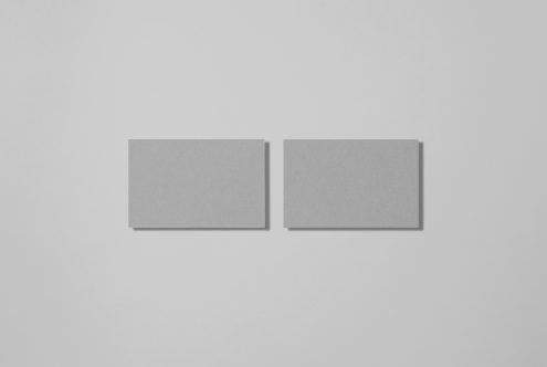 Two grey square mockup cards on a light background, ideal for branding presentation, design showcase, stationery mockups.