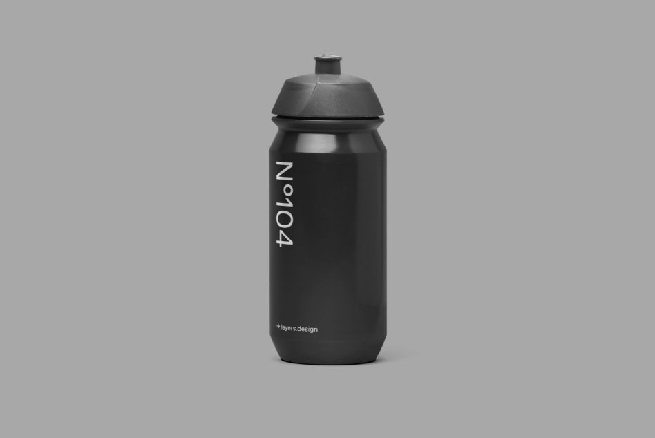 Black water bottle mockup with minimalist design on gray background, perfect for showcasing branding and packaging designs.