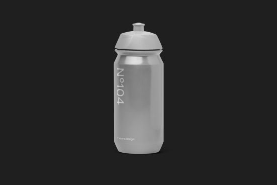 Realistic sports bottle mockup in a sleek design, with water-drop detailing, ideal for branding projects and packaging presentations.